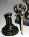 1876 Edison Electric Pen & Stand 1876 Smithsonian OM.jpg (116622 bytes)
